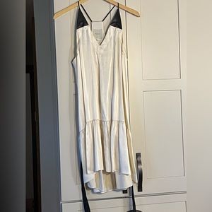 Mason cream silk with lambs wool (leather look) trim, racer back, size 2